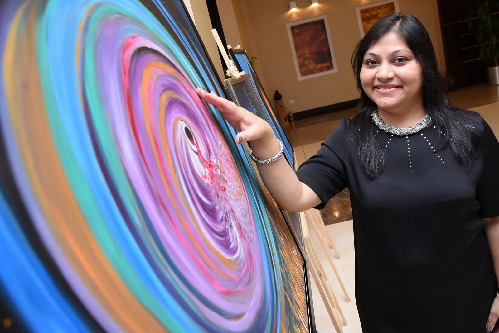 Artist with painting